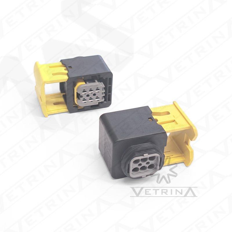 Conector fêmea selado TE Connectivity série MCON de 6 vias, modelo 2-1418469-1, cor cinza com trava secundária amarela, projetado para alta confiabilidade em sistemas eletrônicos veiculares.